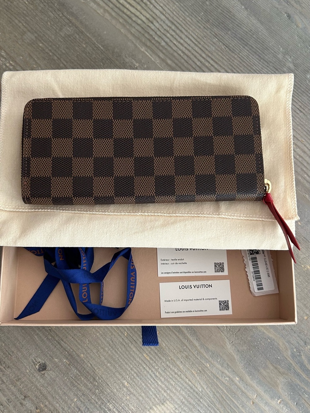 Authentic Louis Vuitton Damier Ebene Zip-Around Wallet with Red Leather Pull